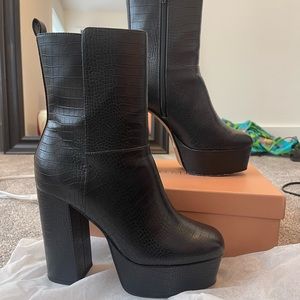 Black platform boots from Urban Outfitters